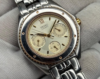 Reloj de cuarzo vintage Seiko Lucent 5Y89-0A30 con fecha, subesfera de 24 horas y esfera japonesa para hombre.