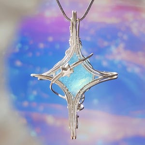 Handmade Blue Serenity Star Pendant: Wire-Wrapped Silverlight Dream Crystal Necklace