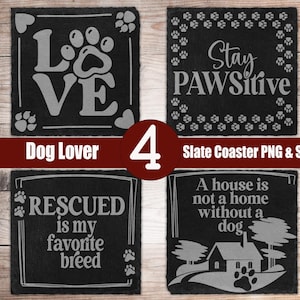 May include: Four black slate coasters with white text and paw print designs. One coaster says "LOVE" with a paw print. Another says "Stay PAWSitive". The third says "Rescued is my favourite breed". The fourth says "A house is not a home without a dog."