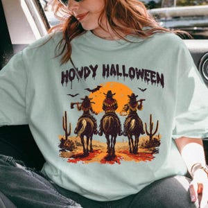 Howdy Halloween PNG, Retro Halloween Png, Funny Halloween PNG, Funny Cowgirl Halloween Shirt Design, Spooky Cute Western Halloween Clipart