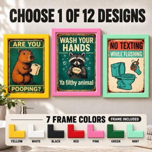 May include: Three rectangular wall signs in yellow, pink, and mint green frames. The signs feature humorous bathroom-themed illustrations: a capybara with toilet paper, a raccoon with soap, and a toilet with a hand holding a phone.