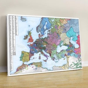 May include: A framed map of Europe, showcasing the continent's political divisions in 1444. The map features a detailed, colorful illustration with various countries and regions labeled. The frame is white, and the map is displayed on a light-colored wall.