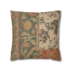 May include: A square throw pillow featuring a patchwork design of three distinct fabric panels. The left panel displays a green floral pattern with red accents, the top right shows a black floral print on beige, and the bottom right is red.