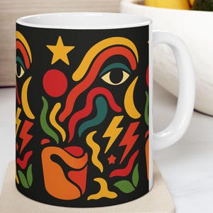 Brighten your morning with this vibrant abstract face pattern ceramic mug—style meets function!