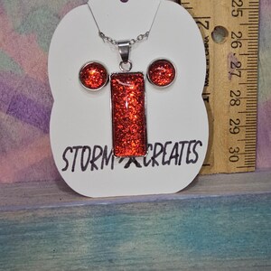 Conjunto de joyas de acero inoxidable con brillo rojo rubí