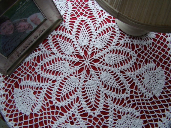 White kaleidoscope and pinwheel crochet table topper doily