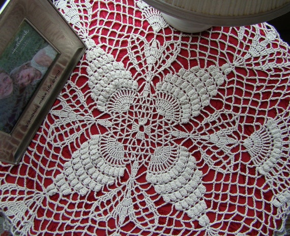 Crochet table topper doily in tan beige with pineapple puff stitching