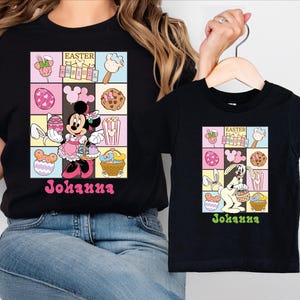 Może przedstawiać: Czarne koszulki z grafiką wielkanocną. Jedna koszulka przedstawia Minnie Mouse z koszykiem wielkanocnym, druga królika. Obie koszulki mają imię "Johanna" w kolorowej czcionce.