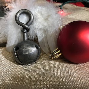 Hand forged jingle bells, sleigh bells, Christmas decoration.