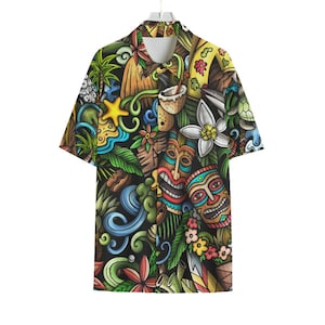 May include: Short-sleeved button-down shirt with a vibrant Hawaiian-themed print. The design features colorful tiki masks, tropical flowers, palm trees, and ocean waves on a black background. The shirt is hanging on a white hanger.