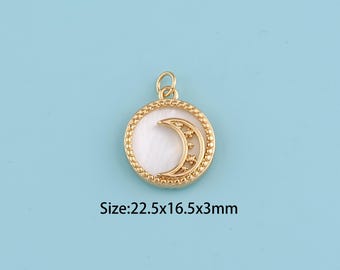 May include: Gold-colored pendant with a white mother-of-pearl inlay and a crescent moon design with stars. The pendant is round, with a beaded edge. The text "Size: 22.5x16.5x3mm" is visible. The pendant is on a light blue background.