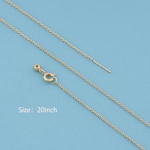 May include: A gold-colored metal chain necklace featuring a delicate link design and a circular spring ring clasp. The necklace includes a small decorative bead near the closure and is clearly labeled with the text Size: 20inch.