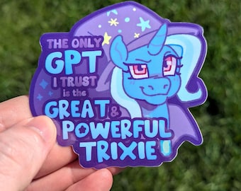 May include: A die-cut sticker featuring a blue unicorn character wearing a purple wizard hat with yellow stars. The text reads: THE ONLY GPT I TRUST is the GREAT & POWERFUL TRIXIE. The design uses shades of blue, purple, and white with a glossy finish.