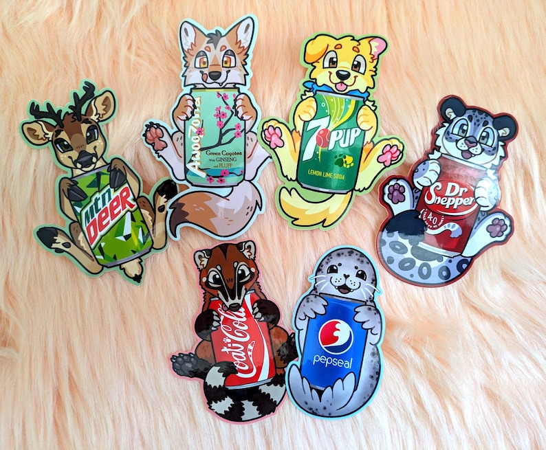 May include: Six die-cut stickers featuring cartoon animals holding soda cans. The animals include a deer with Mtn Deer, a fox with AwooZona, a dog with 7Pup, a snow leopard with Dr. Snepper, a coati with Coat-Cola, and a seal with Pepseal.