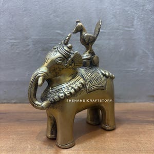 Tintero antiguo de latón con forma de pájaro sobre elefante – Objeto de colección para decoración de escritorio antigua
