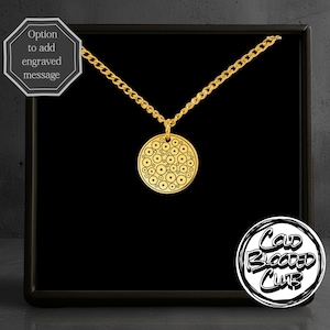 May include: A gold-colored necklace with a circular pendant featuring a pattern of concentric circles. The necklace is displayed in a black box. The text "Option to add engraved message" is in a white box. The Cold Blooded Club logo is in the bottom right corner.