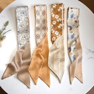 Set of 4 soft satin printed scarves – versatile, Lightweight accessories perfect for women’s hair, Neck, Or outfit styling.