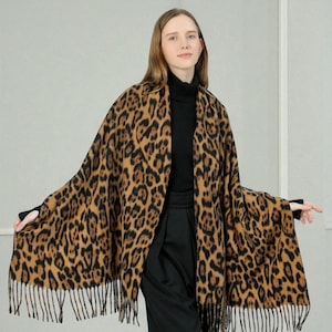 Leopard scarf for women, Warm and stylish with tassels. Perfect for a trendy fall winter 2025 look. Wild style guaranteed!