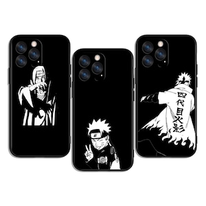May include: Three black phone cases with white anime character designs. One case features a character in a cloak, another shows a character making a peace sign, and the third displays a character with Japanese text.
