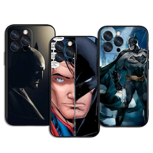 May include: Three black phone cases featuring Batman and Superman comic book art. One case shows Batman's silhouette, another combines Superman and Batman, and the third depicts Batman in a cape.