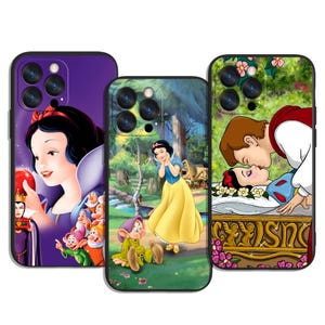 May include: Three phone cases with Snow White designs. One case shows Snow White with the Evil Queen, another shows Snow White in the forest with a dwarf, and the third depicts the kiss with the prince. The cases have black borders.
