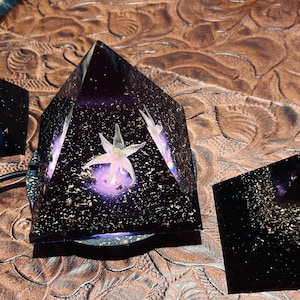 May include: A rustic wooden sign with the text "Welcome to our home" in a handwritten style. The sign features a distressed finish and a simple, inviting design, perfect for entryway decor.