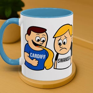 Cardiff vs Swansea Rivalry Mug - Funny Welsh Football Banter Gift - Hilarious Cartoon for Soccer Fans - Unique Gag Present for Him or Her