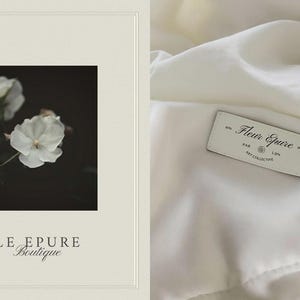 May include: An elegant product presentation featuring a framed image of white flowers against a dark background, and a close-up of a white fabric with a label that reads "Fleur Epure, Art Collector, London."