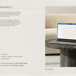 May include: A laptop displaying logo designs sits on a dark, round table. The text "NEUTRE LOGO KIT 2" is at the top, with details about the product, including 30 logos, Canva, and Adobe Illustrator compatibility. The background features a neutral-toned sofa.