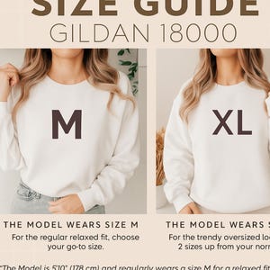 May include: Size guide for Gildan 18000 sweatshirts. Two models wear white sweatshirts, one with an M and the other with an XL. Text explains sizing for regular and oversized fits. The model is 5'10" (178 cm) and wears a size M for a relaxed fit.