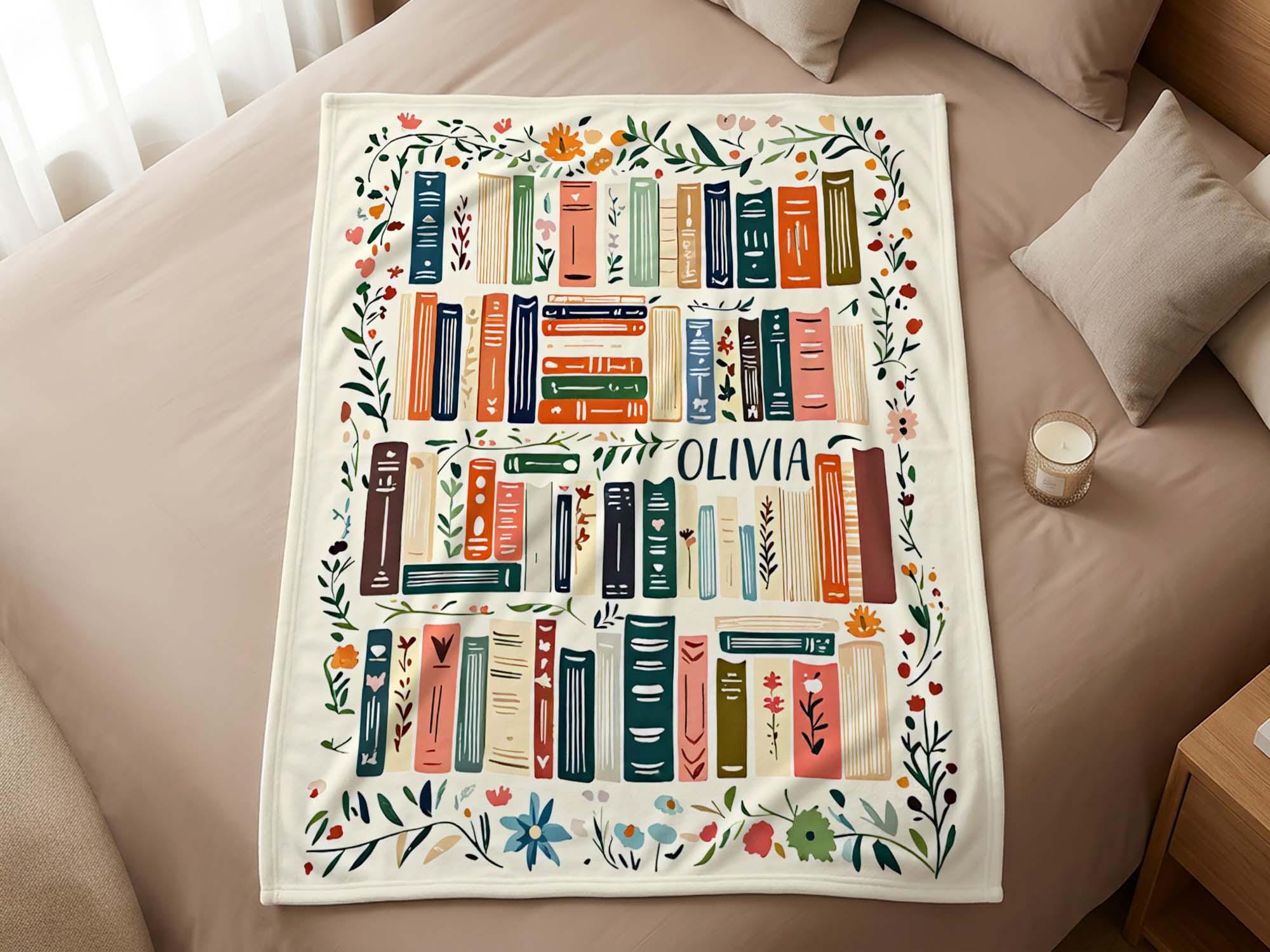 Personalized book blanket styled on a bed