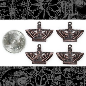 May include: Four antique copper-toned pendants featuring a winged goddess figure with outstretched arms. The pendants are approximately the size of a US quarter.