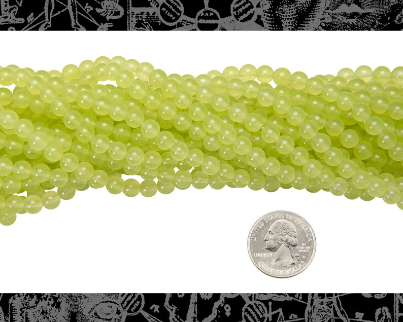 May include: A strand of light green jade beads, approximately 6mm in diameter, with a US quarter for scale.