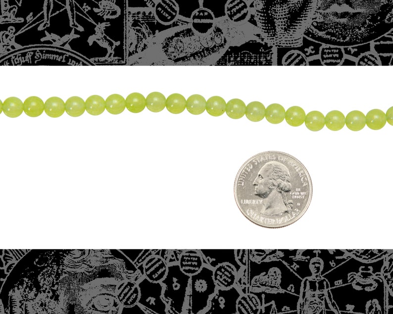 May include: A strand of light green jade beads, approximately the size of a US quarter.