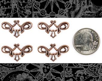 May include: Four antique copper-colored metal embellishments with a decorative scroll design. Each embellishment is about the size of a US quarter.