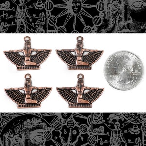 May include: Four antique copper-toned charms featuring an Egyptian goddess with outstretched wings. The charms are approximately the size of a US quarter.