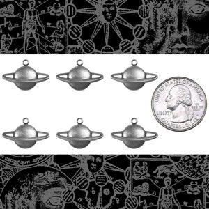 May include: Six silver-toned Saturn charm pendants, each with a ring for attaching to a chain or bracelet. The charms are approximately the size of a US quarter.