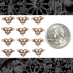 May include: Twelve antique copper-toned metal connector charms with a decorative swirl design. Each charm has two loops for attaching to jewelry or other crafts. The charms are about the size of a US quarter.