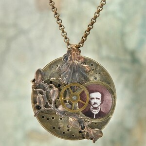 May include: A brass necklace with a round pendant featuring a vintage clock face, a gear, a floral design, and a portrait of Edgar Allan Poe.