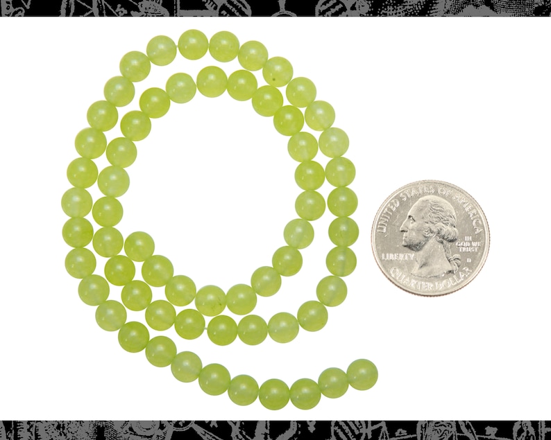May include: A strand of light green jade beads, approximately the size of a US quarter.