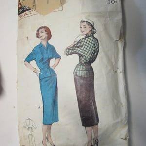 May include: Vintage sewing pattern featuring illustrations of two women in dresses. The pattern is on aged paper with the text "PR PAT" visible. The pattern includes measurements and a price of 50¢.
