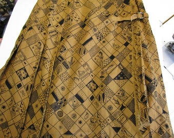 Vintage Brown and Black printed, Pleated Wrap kilt skirt, 1950s, medium sized.