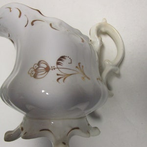 Vintage Creamer with Gold accents, Pottery mark 1857