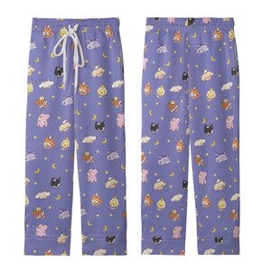 May include: Lavender pajama pants with a repeating pattern of cartoon animals, clouds, moons, and stars. The pants have a drawstring waist. The pajama pants are made of a soft material.