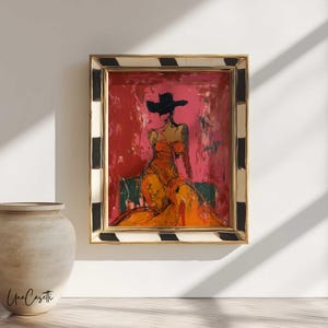 May include: Abstract painting of a woman in an orange dress and black hat, framed in gold with black and white accents. The artwork has a red and pink background. The painting is signed "Una Casetti".