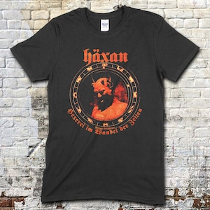 Camiseta Häxan - Brujería a través de los tiempos - Negra 100% algodón hilado en anillos