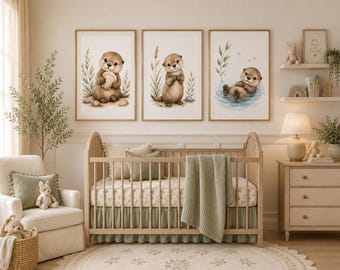 May include: A set of three framed wall art prints featuring watercolor illustrations of brown otters. One otter holds a seashell, one stands among reeds, and one floats in blue water. The prints are displayed in light wood frames above a wooden crib.