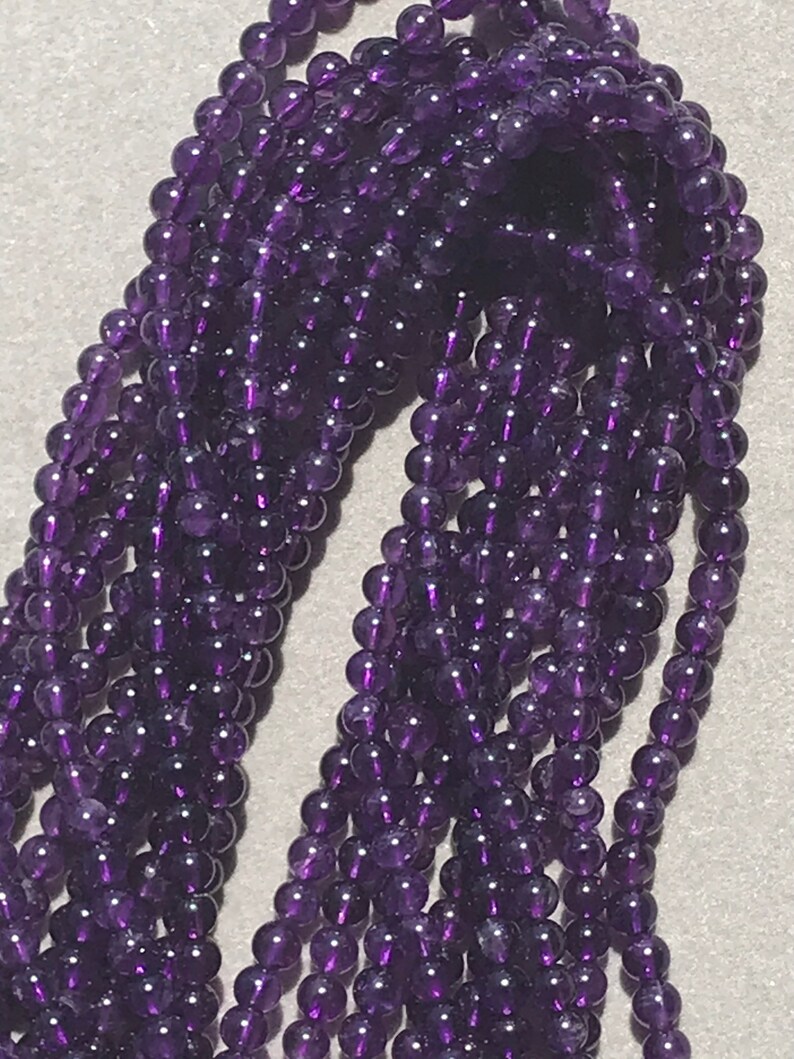 8mm Natural Amethyst Round Faceted 15.5\u201d Strand