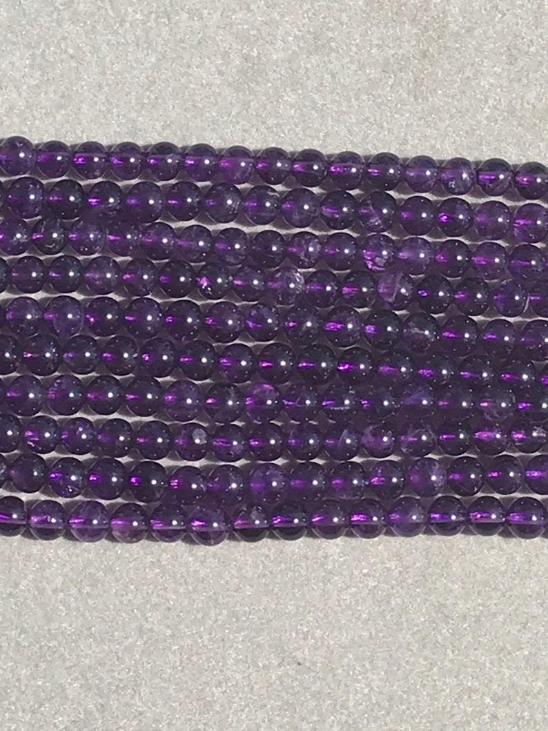 8mm Natural Amethyst Round Faceted 15.5\u201d Strand