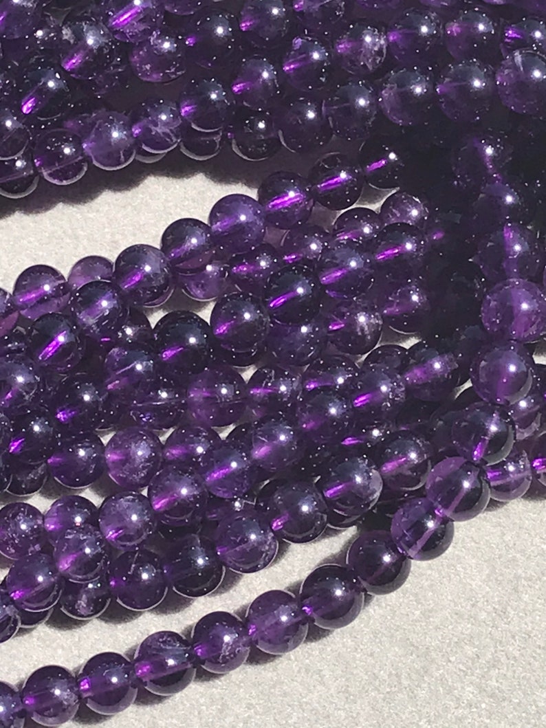 8mm Natural Amethyst Round Faceted 15.5\u201d Strand